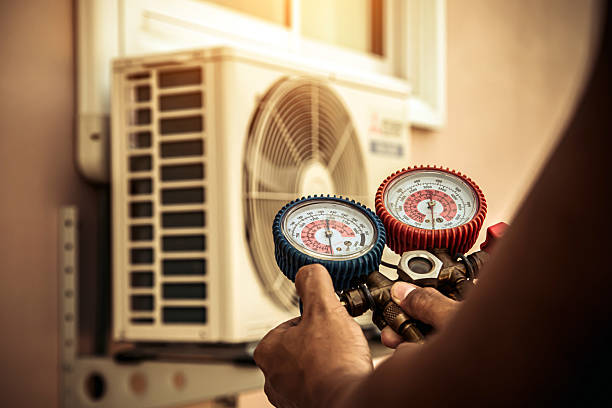 Professional Ac Installation technician working in Woodland Mills, TN